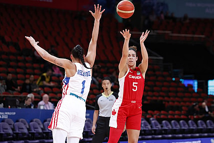 Sep 29, 2022; Sydney,  AUS; Canada player Kia Nurse (5) takes shot against Puerto Rico player Tayra Melendez (1) in second half at Sydney SuperDome. Mandatory Credit: Yukihito Taguchi-USA TODAY Sports