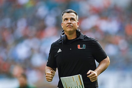 Oct 22, 2022; Miami Gardens, Florida, USA; Miami Hurricanes head coach Mario Cristobal runs on the field during the third quarter against the Duke Blue Devils at Hard Rock Stadium. Mandatory Credit: Sam Navarro-USA TODAY Sports