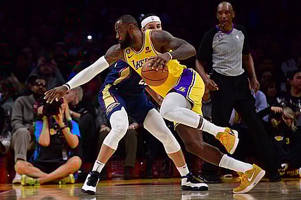 Nov 2, 2022; Los Angeles, California, USA; Los Angeles Lakers forward LeBron James (6) moves to the basket against New Orleans Pelicans forward Larry Nance Jr. (22) during the second half at Crypto.com Arena. Mandatory Credit: Gary A. Vasquez-USA TODAY Sports