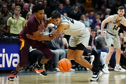 Dec 1, 2022; Boulder, Colorado, USA; Colorado Buffaloes forward Tristan da Silva (23) and Arizona State Sun Devils guard Desmond Cambridge Jr. (4) reach for a loose ball in the second half at the CU Events Center. Mandatory Credit: Ron Chenoy-USA TODAY Sports
