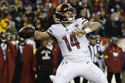 Jan 8, 2023; Landover, Maryland, USA; Washington Commanders quarterback Sam Howell (14) passes the ball against the Dallas Cowboys at FedExField. Mandatory Credit: Geoff Burke-USA TODAY Sports
