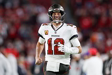 Jan 16, 2023; Tampa, Florida, USA; Tampa Bay Buccaneers quarterback Tom Brady (12) takes the field before a wild card game against the Dallas Cowboys at Raymond James Stadium. Mandatory Credit: Nathan Ray Seebeck-USA TODAY Sports