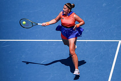 Jan 22, 2023; Melbourne, VICTORIA, Australia; Jelena Ostapenko from Latvia during her fourth round match against Coco Gauff from the United States on day seven of the 2023 Australian Open tennis tournament at Melbourne Park. Mandatory Credit: Mike Frey-USA TODAY Sports