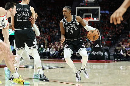 Jan 23, 2023; Portland, Oregon, USA; San Antonio Spurs guard Josh Richardson (7) dribbles the ball against the Portland Trail Blazers in the second half at Moda Center. Mandatory Credit: Jaime Valdez-USA TODAY Sports