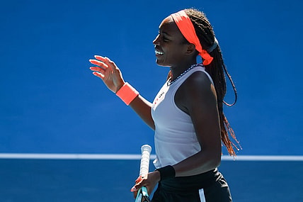 Jan 25, 2023; Melbourne, Victoria, Australia; Coco Gauff from the United States celebrates with partner Jessica Pegula (not pictured) after winning their quarter finals doubles match on day ten of the 2023 Australian Open tennis tournament at Melbourne Park. Mandatory Credit: Mike Frey-USA TODAY Sports