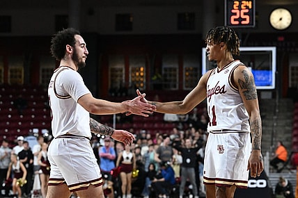 Jan 31, 2023; Chestnut Hill, Massachusetts, USA; Boston College Eagles guard Jaeden Zackery (3) reacts with guard Makai Ashton-Langford (11) during a timeout in first half of a game against the Clemson Tigers at the Conte Forum. Mandatory Credit: Brian Fluharty-USA TODAY Sports
