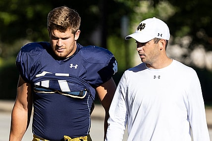 Notre Dame's Michael Mayer and offensive coordinator Tommy Rees prior to Notre Dame Fall Practice on Friday, August 12, 2022, at Irish Athletics Center in South Bend, Indiana.

Ncaa Foorball 2022 Notre Dame Fall Practice