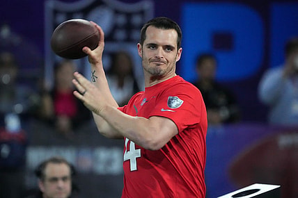 Feb 2, 2023; Henderson, NV, USA; Las Vegas Raiders quarterback Derek Carr (4) throws the ball during the Pro Bowl Skills competition at the Intermountain Healthcare Performance Facility. Mandatory Credit: Kirby Lee-USA TODAY Sports