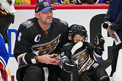 Feb 3, 2023; Sunrise, Florida, USA; Washington Capitals left wing Alex Ovechkin (8) with his son Sergei during the 2023 NHL All-Star Skills Competition at FLA Live Arena. Mandatory Credit: Jasen Vinlove-USA TODAY Sports