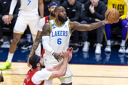 Feb 4, 2023; New Orleans, Louisiana, USA;  Los Angeles Lakers forward LeBron James (6) drives to the basket against New Orleans Pelicans forward Larry Nance Jr. (22) during the second half at Smoothie King Center. Mandatory Credit: Stephen Lew-USA TODAY Sports