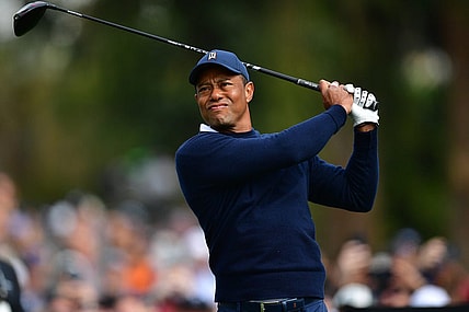 Feb 16, 2023; Pacific Palisades, California, USA; Tiger Woods hits from the second hole tee during the first round of The Genesis Invitational golf tournament. Mandatory Credit: Gary A. Vasquez-USA TODAY Sports