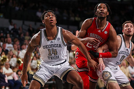 Feb 25, 2023; Atlanta, Georgia, USA; Georgia Tech Yellow Jackets forward Jalon Moore (14) boxes out Louisville Cardinals forward Jae'Lyn Withers (24) in the first half at McCamish Pavilion. Mandatory Credit: Brett Davis-USA TODAY Sports