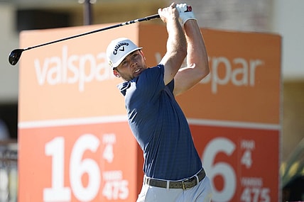 Mar 20, 2022; Palm Harbor, Florida, USA; Sam Burns tees off on the 16th hole during the final round of the Valspar Championship golf tournament. Mandatory Credit: Jasen Vinlove-USA TODAY Sports