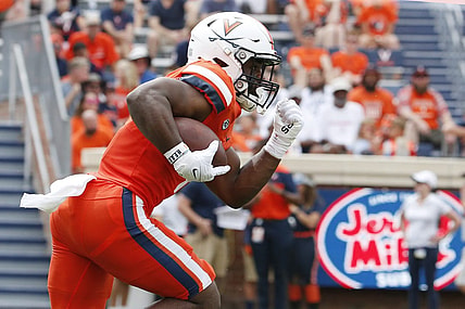 Sep 3, 2022; Charlottesville, Virginia, USA; Virginia Cavaliers running back Mike Hollins (7) carries the ball during the first half against the Richmond Spiders at Scott Stadium. Mandatory Credit: Amber Searls-USA TODAY Sports
