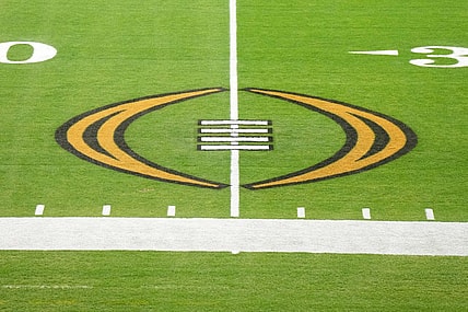 Dec 30, 2022; Glendale AZ, USA; The College Football Playoff logo on the field at State Farm Stadium, the site of the 2022 CFP Semifinal between the TCU Horned Frogs and the Michigan Wolverines and Super Bowl 57 (LVII). Mandatory Credit: Kirby Lee-USA TODAY Sports