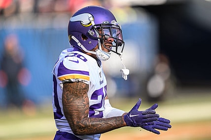 Jan 8, 2023; Chicago, Illinois, USA; Minnesota Vikings cornerback Duke Shelley (20) celebrates a defensive pass break up during the third quarter against the Chicago Bears at Soldier Field. Mandatory Credit: Daniel Bartel-USA TODAY Sports