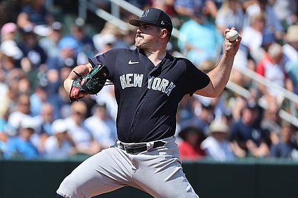 Mar 5, 2023; North Port, Florida, USA; New York Yankees starting pitcher Carlos Rodon (55) throws a pitch during the first inning against the Atlanta Braves at CoolToday Park. Mandatory Credit: Kim Klement-USA TODAY Sports