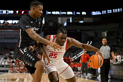 Mar 11, 2023; Fort Worth, TX, USA; Cincinnati Bearcats guard Landers Nolley II (2) battles for the ball with Houston Cougars forward Jarace Walker (25) during the first half at Dickies Arena. Mandatory Credit: Jerome Miron-USA TODAY Sports
