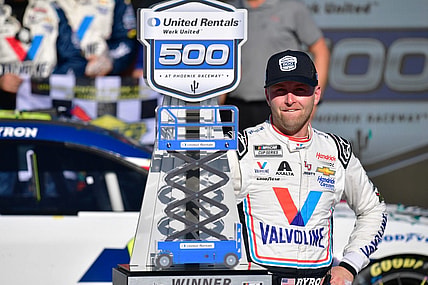 Mar 12, 2023; Avondale, Arizona, USA; NASCAR Cup Series driver William Byron (24) celebrates his victory of the United Rentals Work United 500 at Phoenix Raceway. Mandatory Credit: Gary A. Vasquez-USA TODAY Sports