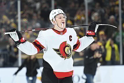Mar 21, 2023; Boston, Massachusetts, USA; Ottawa Senators left wing Brady Tkachuk (7) skates off the ice after losing to the Boston Bruins at TD Garden. Mandatory Credit: Bob DeChiara-USA TODAY Sports