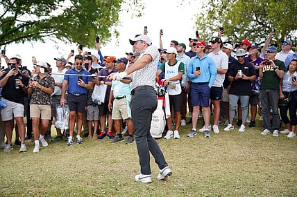Mar 23, 2023; Austin, Texas, USA; Rory McIlroy chips from outside the ropes during the second round of the World Golf Championships-Dell Technologies Match Play golf tournament. Mandatory Credit: Dustin Safranek-USA TODAY Sports