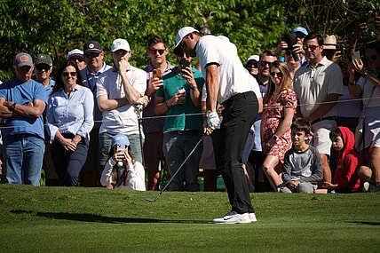 Mar 25, 2023; Austin, Texas, USA; Scotty Scheffler chips from the fairway at the sixteenth hole in a match against Jason Day during the fourth round of the World Golf Championships-Dell Technologies Match Play golf tournament. Mandatory Credit: Dustin Safranek-USA TODAY Sports
