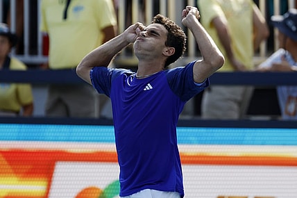 Mar 27, 2023; Miami, Florida, US; Francisco Cerundolo (ARG) celebrates after his match against Felix Auger-Aliassime (CAN) on day eight of the Miami Open at Hard Rock Stadium. Mandatory Credit: Geoff Burke-USA TODAY Sports