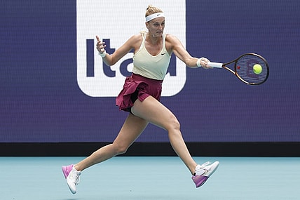 Mar 31, 2023; Miami, Florida, US; Petra Kvitova (CZE) hits a forehand against Sorana Cirstea (ROU) (not pictured) in a women's singles semifinal on day twelve on the Miami Open at Hard Rock Stadium. Mandatory Credit: Geoff Burke-USA TODAY Sports