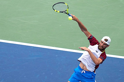 Maxime Cressy hits a slam while playing against Botic van de Zandschulp at the Western & Southern Open at the Lindner Family Tennis Center in Mason, Ohio, on Sunday, Aug. 14, 2022.

Western Southern Open Day One 012