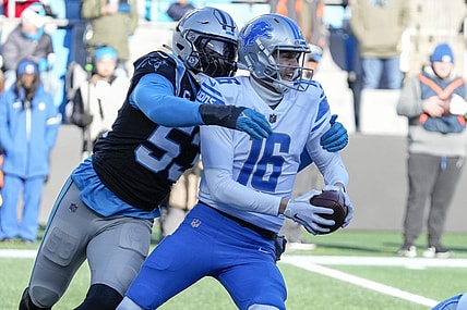 Dec 24, 2022; Charlotte, North Carolina, USA; Carolina Panthers defensive end Brian Burns (53) sacks Detroit Lions quarterback Jared Goff (16) during the second half at Bank of America Stadium. Mandatory Credit: Jim Dedmon-USA TODAY Sports