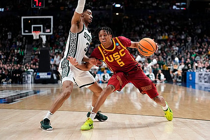 Mar 17, 2023; Columbus, Ohio, USA;  USC Trojans guard Boogie Ellis (5) dribbles aroun dMichigan State Spartans guard Jaden Akins (3) during the first round of the NCAA men   s basketball tournament at Nationwide Arena. Mandatory Credit: Adam Cairns-The Columbus Dispatch

Basketball Ncaa Men S Basketball Tournament