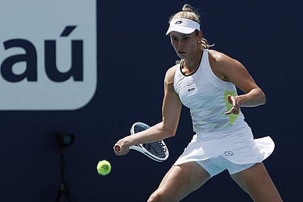 Mar 23, 2023; Miami, Florida, US; Elise Mertens (BEL) hits a forehand against Daria Kasatkina (not pictured) on day four of the Miami Open at Hard Rock Stadium. Mandatory Credit: Geoff Burke-USA TODAY Sports