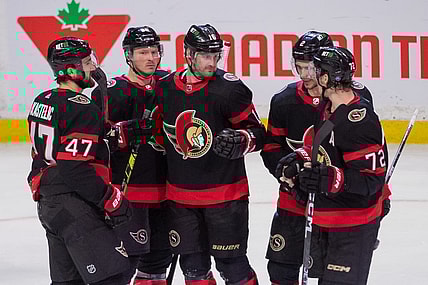 Mar 23, 2023; Ottawa, Ontario, CAN; Ottawa Senators left wing Austin Watson (16) celebrates with team his goal scored in the third period against the Tampa Bay Lightning at the Canadian Tire Centre. Mandatory Credit: Marc DesRosiers-USA TODAY Sports