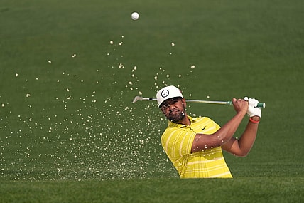 Apr 7, 2023; Augusta, Georgia, USA; Tony Finau plays a shot from a bunker on the second hole during the second round of The Masters golf tournament. Mandatory Credit: Michael Madrid-USA TODAY Network
