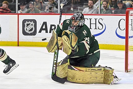Apr 11, 2023; Saint Paul, Minnesota, USA;  Minnesota Wild goalie Marc-Andre Fleury (29) makes a glove save against the Winnipeg Jets during the third period at at Xcel Energy Center. Mandatory Credit: Nick Wosika-USA TODAY Sports
