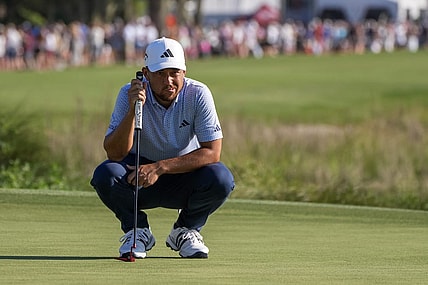 Apr 15, 2023; Hilton Head, South Carolina, USA; Xander Schauffele lines up a putt on the 18th green during the third round of the RBC Heritage golf tournament. Mandatory Credit: David Yeazell-USA TODAY Sports