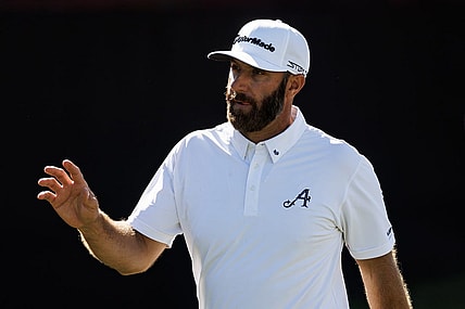Apr 21, 2023; Adelaide, South Australia AUS;  Dustin Johnson of team Aces waves to the crowd on the twelfth hole during the first round of LIV Golf Adelaide golf tournament at Grange Golf Club. Mandatory Credit: Mike Frey-USA TODAY Sports