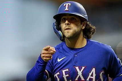 Apr 25, 2023; Cincinnati, Ohio, USA; Texas Rangers third baseman Josh Jung (6) reacts after hitting a solo home run in the sixth inning against the Cincinnati Reds at Great American Ball Park. Mandatory Credit: Katie Stratman-USA TODAY Sports