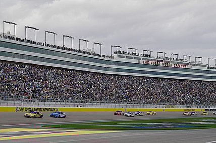 Mar 6, 2022; Las Vegas, Nevada, USA; General view as NASCAR Cup Series driver Christopher Bell (20) leads driver Kyle Larson (5) and a group during the Pennzoil 400 at Las Vegas Motor Speedway. Mandatory Credit: Gary A. Vasquez-USA TODAY Sports