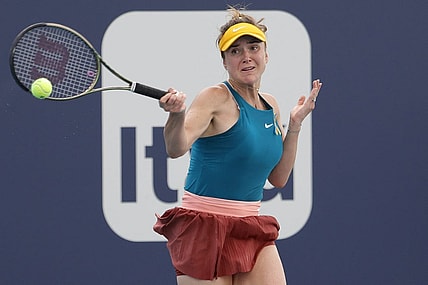 Mar 24, 2022; Miami Gardens, FL, USA; Elina Svitolina (UKR) hits a forehand against Heather Watson (GBR) (not pictured) in a second round women's singles match in the Miami Open at Hard Rock Stadium. Mandatory Credit: Geoff Burke-USA TODAY Sports