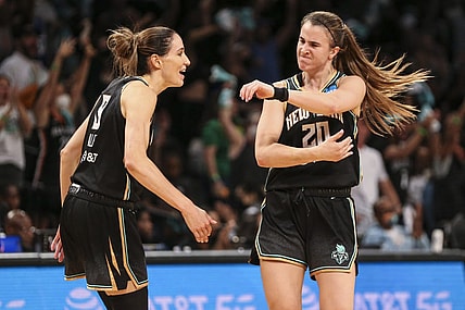Aug 23, 2022; Brooklyn, New York, USA; New York Liberty guard Sabrina Ionescu (20) celebrates with guard Rebecca Allen (9) after making a three point shot in the fourth quarter against the Chicago Sky at Barclays Center. Mandatory Credit: Wendell Cruz-USA TODAY Sports