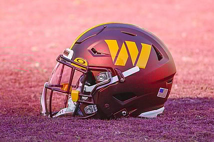 Jan 1, 2023; Landover, Maryland, USA; Washington Commanders helmet on the field before the game against the Cleveland Browns at FedExField. Mandatory Credit: Brad Mills-USA TODAY Sports