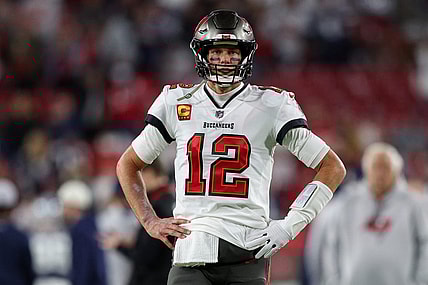 Jan 16, 2023; Tampa, Florida, USA; Tampa Bay Buccaneers quarterback Tom Brady (12) looks on before a  wild card game against the Dallas Cowboys at Raymond James Stadium. Mandatory Credit: Nathan Ray Seebeck-USA TODAY Sports