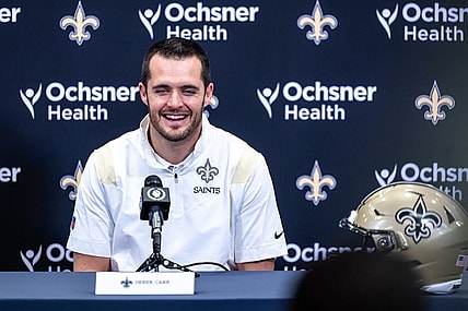 Mar 11, 2023; Metairie, LA, USA;   New Orleans Saints quarterback Derek Carr (4) speaks at Ochsner Sports Performance Center. Mandatory Credit: Stephen Lew-USA TODAY Sports