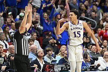 Mar 18, 2023; Des Moines, IA, USA; Kansas Jayhawks guard Kevin McCullar Jr. (15) reacts after a basket against the Arkansas Razorbacks during the second half at Wells Fargo Arena. Mandatory Credit: Jeffrey Becker-USA TODAY Sports