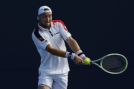 Mar 21, 2023; Miami, Florida, US; Jan-Lennard Struff (BEL) hits a backhand against Zhizhen Zhang (CHN) (not pictured) on day two of the Miami Open at Hard Rock Stadium. Mandatory Credit: Geoff Burke-USA TODAY Sports