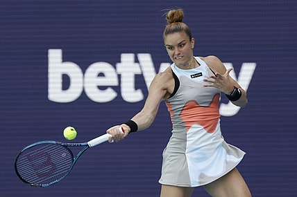 Mar 24, 2023; Miami, Florida, US; Maria Sakkari (GRE) hits a forehand against Bianca Andreescu (CAN) (not pictured) on day five of the Miami Open at Hard Rock Stadium. Mandatory Credit: Geoff Burke-USA TODAY Sports