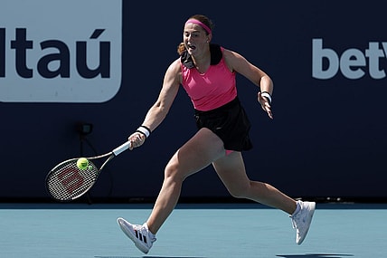 Mar 27, 2023; Miami, Florida, US; Jelena Ostapenko (LAT) hits a forehand against Martina Trevisan (ITA) (not pictured) on day eight of the Miami Open at Hard Rock Stadium. Mandatory Credit: Geoff Burke-USA TODAY Sports