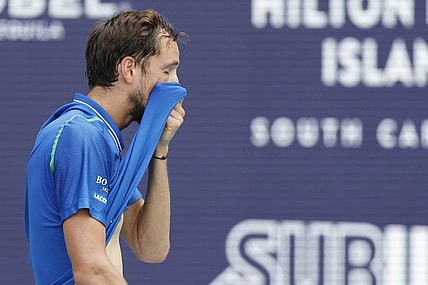 Apr 2, 2023; Miami, Florida, US; Daniil Medvedev wipes his face between points against Jannik Sinner (ITA) (not pictured) in the men's singles final on day fourteen of the Miami Open at Hard Rock Stadium. Mandatory Credit: Geoff Burke-USA TODAY Sports