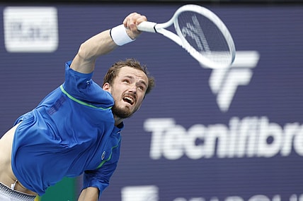 Apr 2, 2023; Miami, Florida, US; Daniil Medvedev serves against Jannik Sinner (ITA) (not pictured) in the men's singles final on day fourteen of the Miami Open at Hard Rock Stadium. Mandatory Credit: Geoff Burke-USA TODAY Sports